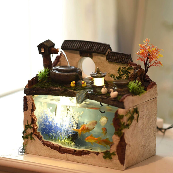 Fontaine intégrée dans un aquarium moderne