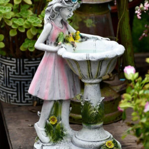 Bain solaire pour oiseaux en fontaine extérieure