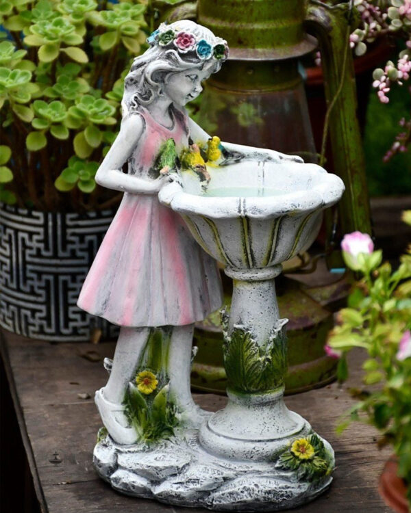 Bain solaire pour oiseaux en fontaine extérieure