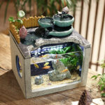Fontaine aquatique avec espace pour poissons colorés