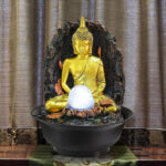 Fontaine avec statue de Bouddha, symbole de sérénité et de paix