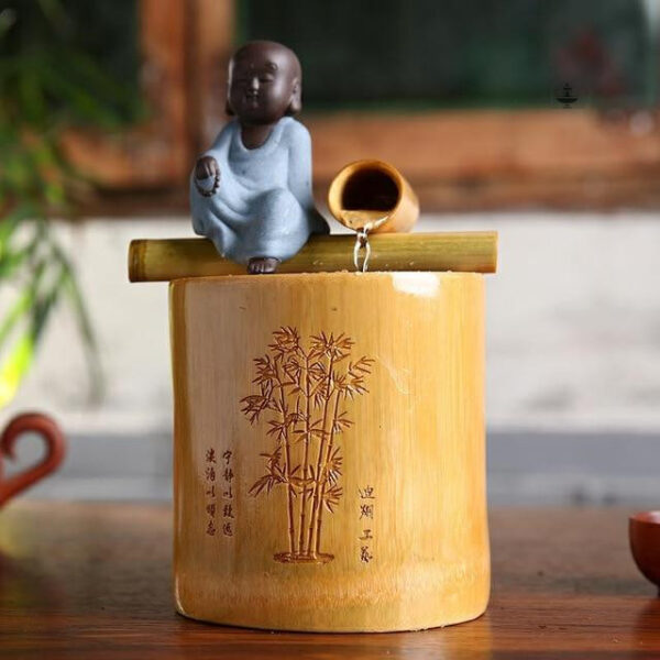 Élément zen : fontaine Bouddha en matériau naturel