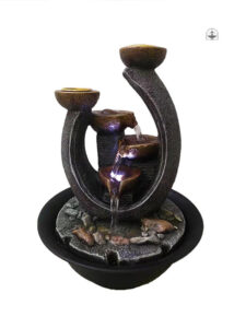 Élément zen avec fontaine et bougies pour votre espace