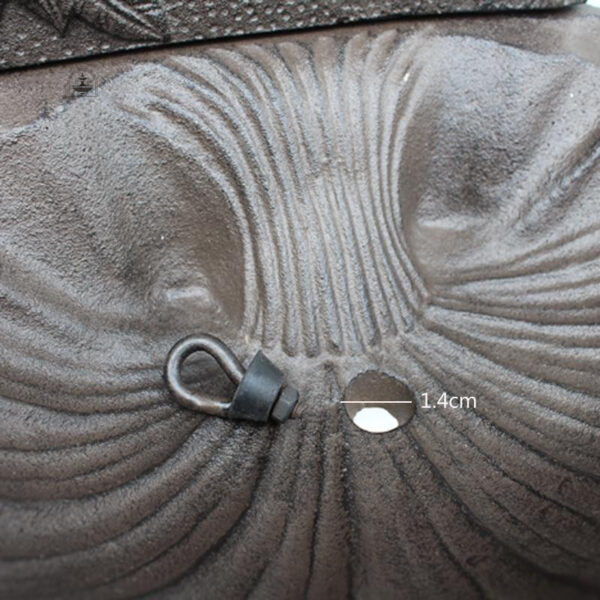 Élégante fontaine murale en fonte pour extérieur