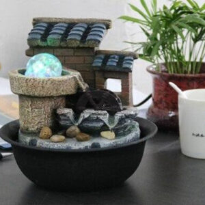 Fontaine décorative en forme de maison, idéale pour la relaxation