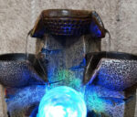 Élégante fontaine en pierre pour ambiance zen extérieure