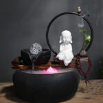 Design zen avec flux d'eau et encens