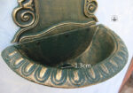 Fontaine en fonte pour embellir le jardin