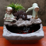 Petite fontaine Bouddha décorative en résine
